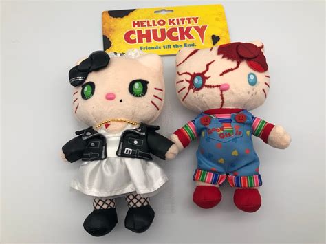 Hello kitty chucky - The mashup of Hello Kitty and Chucky continues at Universal Orlando Resort with a new Hello Kitty Chucky plush and pillow. The first round of this merchandise — including a Spirit Jersey, T-shirt, and pin — was released in August, followed by a purse, bucket hat, and cardholder.The latter three items are currently sold out.